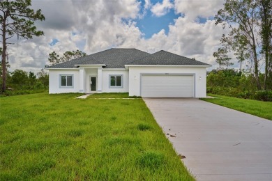 Beautiful new construction in Indian Lake Estates! A golf and on Indian Lake Estates Golf and Country Club in Florida - for sale on GolfHomes.com, golf home, golf lot