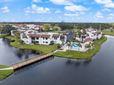 This spacious and immaculately maintained condo is positioned on Capri Isle Golf Club in Florida - for sale on GolfHomes.com, golf home, golf lot