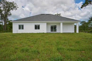 Beautiful new construction in Indian Lake Estates! A golf and on Indian Lake Estates Golf and Country Club in Florida - for sale on GolfHomes.com, golf home, golf lot