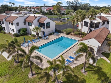 This spacious and immaculately maintained condo is positioned on Capri Isle Golf Club in Florida - for sale on GolfHomes.com, golf home, golf lot