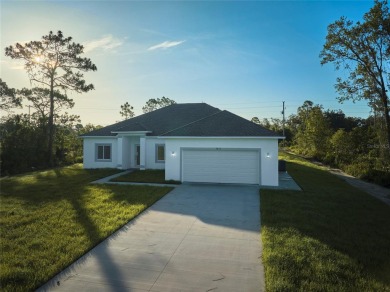 Beautiful new construction in Indian Lake Estates! A golf and on Indian Lake Estates Golf and Country Club in Florida - for sale on GolfHomes.com, golf home, golf lot