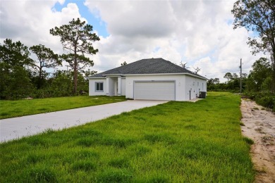 Beautiful new construction in Indian Lake Estates! A golf and on Indian Lake Estates Golf and Country Club in Florida - for sale on GolfHomes.com, golf home, golf lot