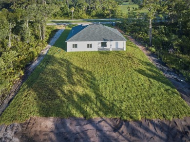 Beautiful new construction in Indian Lake Estates! A golf and on Indian Lake Estates Golf and Country Club in Florida - for sale on GolfHomes.com, golf home, golf lot