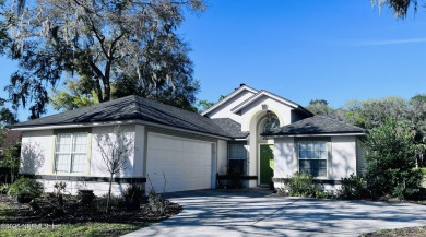 Welcome to your dream retreat! Stunning views of a pond and on Blue Cypress Golf Club in Florida - for sale on GolfHomes.com, golf home, golf lot