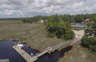 Enjoy stunning water views from this homesite tucked away on a on The Club At Osprey Cove in Georgia - for sale on GolfHomes.com, golf home, golf lot