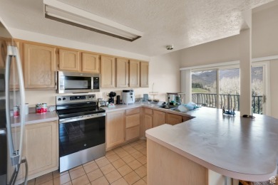 Perched in the heart of Midway's coveted Swiss Oaks community on Homestead Golf Club and Resort in Utah - for sale on GolfHomes.com, golf home, golf lot