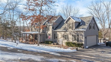 Distinctive home within the gated community of Old Kinderhook at on The Club At Old Kinderhook in Missouri - for sale on GolfHomes.com, golf home, golf lot