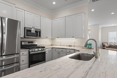 Where comfort meets coastal elegance, this furnished on Regatta Bay Golf and Country Club in Florida - for sale on GolfHomes.com, golf home, golf lot