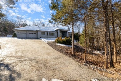 Prepare for entertaining in this modern home located in the on The Club At Old Kinderhook in Missouri - for sale on GolfHomes.com, golf home, golf lot