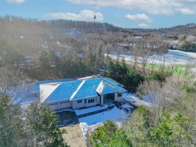 Prepare for entertaining in this modern home located in the on The Club At Old Kinderhook in Missouri - for sale on GolfHomes.com, golf home, golf lot