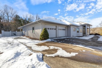 Prepare for entertaining in this modern home located in the on The Club At Old Kinderhook in Missouri - for sale on GolfHomes.com, golf home, golf lot