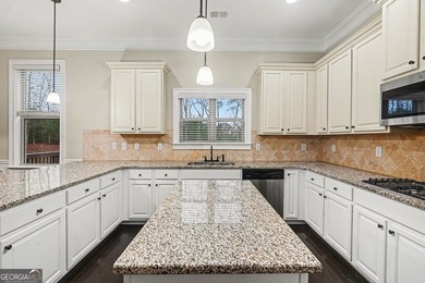 This 4-bedroom, 2.5-bath home located on a cul-de-sac street in on Crystal Lake Golf and Country Club in Georgia - for sale on GolfHomes.com, golf home, golf lot