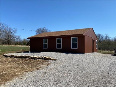 New ranch home in Linn Valley has just been built. One level on Linn Valley Lakes - Deer Trace Golf Course in Kansas - for sale on GolfHomes.com, golf home, golf lot