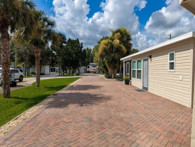 This extra deep RV site offers everything you need for your RV on The Great Outdoors Golf and Country Club in Florida - for sale on GolfHomes.com, golf home, golf lot