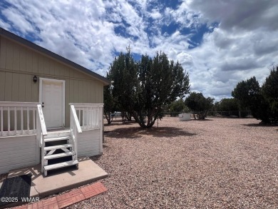 Fully furnished home in White Mountain Lakes on a spacious 0 on Silver Creek Golf Club in Arizona - for sale on GolfHomes.com, golf home, golf lot