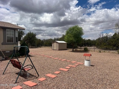 Fully furnished home in White Mountain Lakes on a spacious 0 on Silver Creek Golf Club in Arizona - for sale on GolfHomes.com, golf home, golf lot