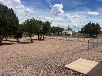 Fully furnished home in White Mountain Lakes on a spacious 0 on Silver Creek Golf Club in Arizona - for sale on GolfHomes.com, golf home, golf lot