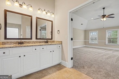 This 4-bedroom, 2.5-bath home located on a cul-de-sac street in on Crystal Lake Golf and Country Club in Georgia - for sale on GolfHomes.com, golf home, golf lot