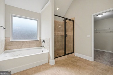 This 4-bedroom, 2.5-bath home located on a cul-de-sac street in on Crystal Lake Golf and Country Club in Georgia - for sale on GolfHomes.com, golf home, golf lot