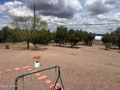 Fully furnished home in White Mountain Lakes on a spacious 0 on Silver Creek Golf Club in Arizona - for sale on GolfHomes.com, golf home, golf lot