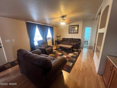 Fully furnished home in White Mountain Lakes on a spacious 0 on Silver Creek Golf Club in Arizona - for sale on GolfHomes.com, golf home, golf lot