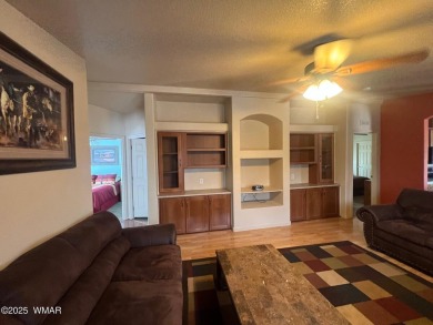 Fully furnished home in White Mountain Lakes on a spacious 0 on Silver Creek Golf Club in Arizona - for sale on GolfHomes.com, golf home, golf lot