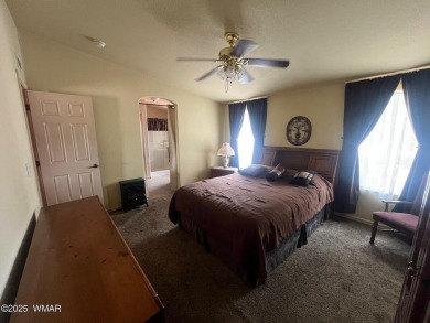 Fully furnished home in White Mountain Lakes on a spacious 0 on Silver Creek Golf Club in Arizona - for sale on GolfHomes.com, golf home, golf lot