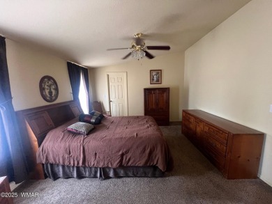 Fully furnished home in White Mountain Lakes on a spacious 0 on Silver Creek Golf Club in Arizona - for sale on GolfHomes.com, golf home, golf lot