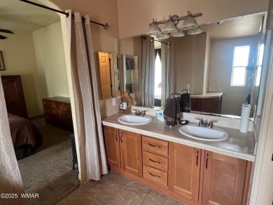 Fully furnished home in White Mountain Lakes on a spacious 0 on Silver Creek Golf Club in Arizona - for sale on GolfHomes.com, golf home, golf lot