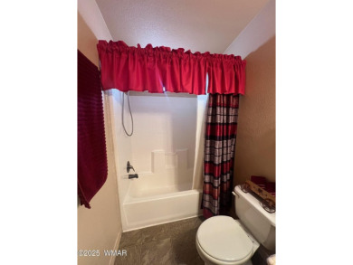 Fully furnished home in White Mountain Lakes on a spacious 0 on Silver Creek Golf Club in Arizona - for sale on GolfHomes.com, golf home, golf lot