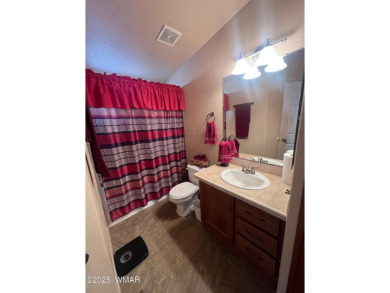 Fully furnished home in White Mountain Lakes on a spacious 0 on Silver Creek Golf Club in Arizona - for sale on GolfHomes.com, golf home, golf lot
