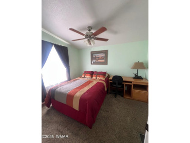 Fully furnished home in White Mountain Lakes on a spacious 0 on Silver Creek Golf Club in Arizona - for sale on GolfHomes.com, golf home, golf lot
