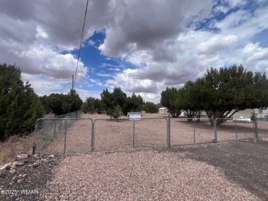 Fully furnished home in White Mountain Lakes on a spacious 0 on Silver Creek Golf Club in Arizona - for sale on GolfHomes.com, golf home, golf lot