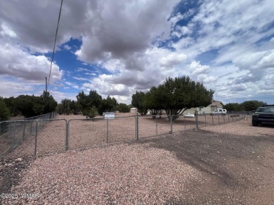 Fully furnished home in White Mountain Lakes on a spacious 0 on Silver Creek Golf Club in Arizona - for sale on GolfHomes.com, golf home, golf lot