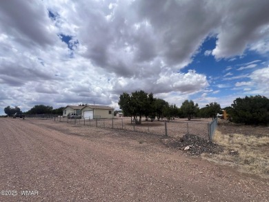 Fully furnished home in White Mountain Lakes on a spacious 0 on Silver Creek Golf Club in Arizona - for sale on GolfHomes.com, golf home, golf lot