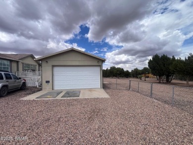 Fully furnished home in White Mountain Lakes on a spacious 0 on Silver Creek Golf Club in Arizona - for sale on GolfHomes.com, golf home, golf lot
