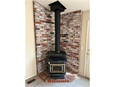 Outstanding price and location, new roof and gutters, very well on Bella Vista Country Club and Golf Course in Arkansas - for sale on GolfHomes.com, golf home, golf lot