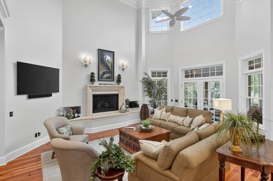 Beautiful brick custom home with FIRST FLOOR PRIMARY SUITE on Dunes West Golf Club in South Carolina - for sale on GolfHomes.com, golf home, golf lot