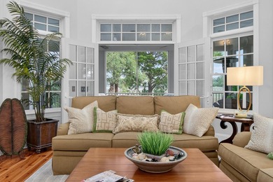 Beautiful brick custom home with FIRST FLOOR PRIMARY SUITE on Dunes West Golf Club in South Carolina - for sale on GolfHomes.com, golf home, golf lot