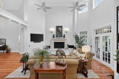 Beautiful brick custom home with FIRST FLOOR PRIMARY SUITE on Dunes West Golf Club in South Carolina - for sale on GolfHomes.com, golf home, golf lot