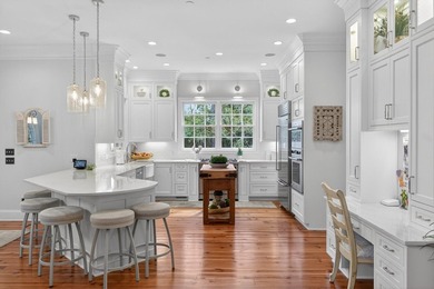 Beautiful brick custom home with FIRST FLOOR PRIMARY SUITE on Dunes West Golf Club in South Carolina - for sale on GolfHomes.com, golf home, golf lot