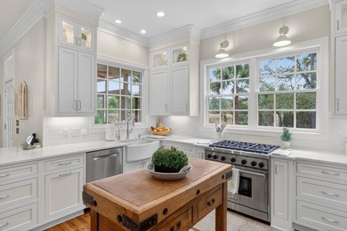 Beautiful brick custom home with FIRST FLOOR PRIMARY SUITE on Dunes West Golf Club in South Carolina - for sale on GolfHomes.com, golf home, golf lot