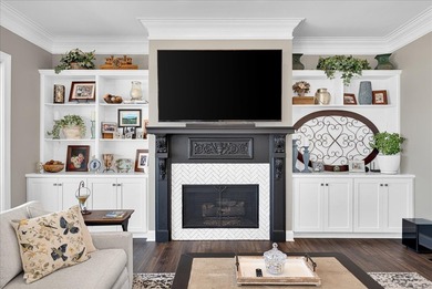 Experience elevated lake living at 244 Compass Point where on The Patriot Golf Club At Grand Harbor in South Carolina - for sale on GolfHomes.com, golf home, golf lot