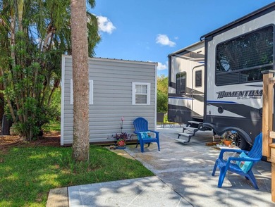 This very private 40x80 R lot backs up to nature and has a 10x12 on The Great Outdoors Golf and Country Club in Florida - for sale on GolfHomes.com, golf home, golf lot