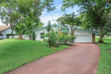 Welcome to Plantation! Behind the gates of Coco Plum Estates and on Jacaranda Golf Club in Florida - for sale on GolfHomes.com, golf home, golf lot