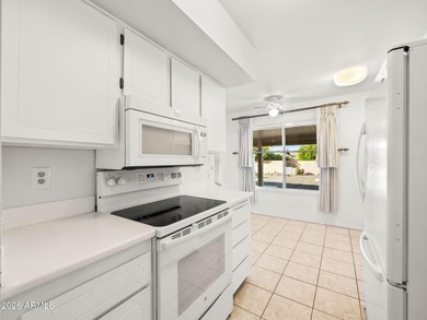 Welcome home to this well-maintained 2 bed, 2 bath Sun City gem on Union Hills Country Club in Arizona - for sale on GolfHomes.com, golf home, golf lot