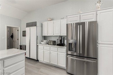 Elegant single-story home in the prestigious guard-gated Spanish on Spanish Trail Golf and Country Club in Nevada - for sale on GolfHomes.com, golf home, golf lot