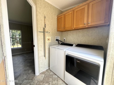 Welcome to your new home! This corner lot manufactured home in on Lake Tansi Village Country Club in Tennessee - for sale on GolfHomes.com, golf home, golf lot