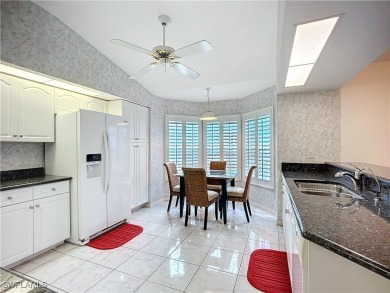 Spectacular north-facing views of a large LAKE and the GOLF on Herons Glen Golf and Country Club in Florida - for sale on GolfHomes.com, golf home, golf lot