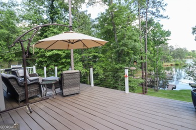This beautifully remodeled 4 bed, 2 bath home in the Turtle Cove on Turtle Cove Golf Course in Georgia - for sale on GolfHomes.com, golf home, golf lot